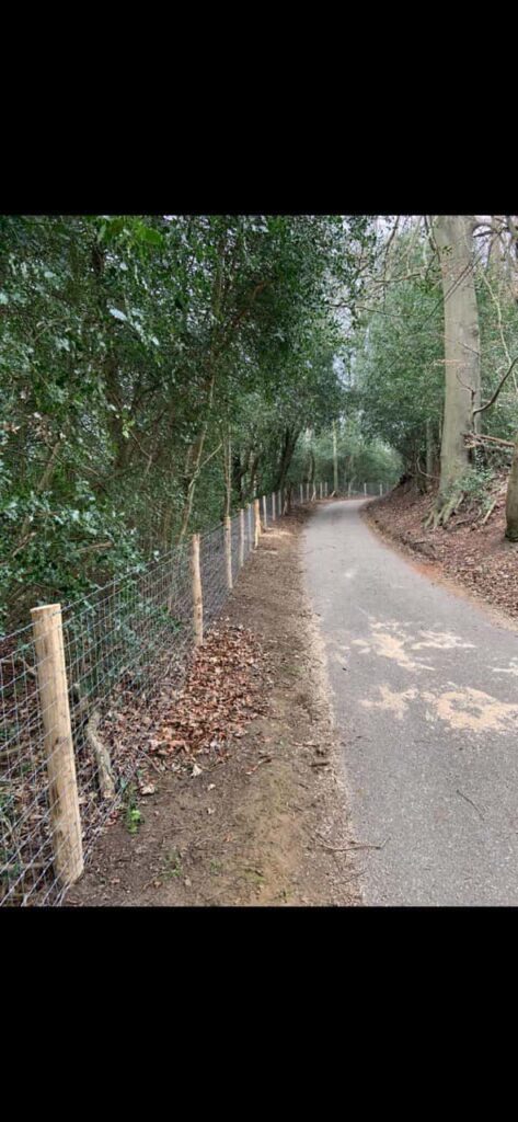 This is a photo of stock fencing installed along the side of a country road. By Fast Fix Fencing Sevenoaks